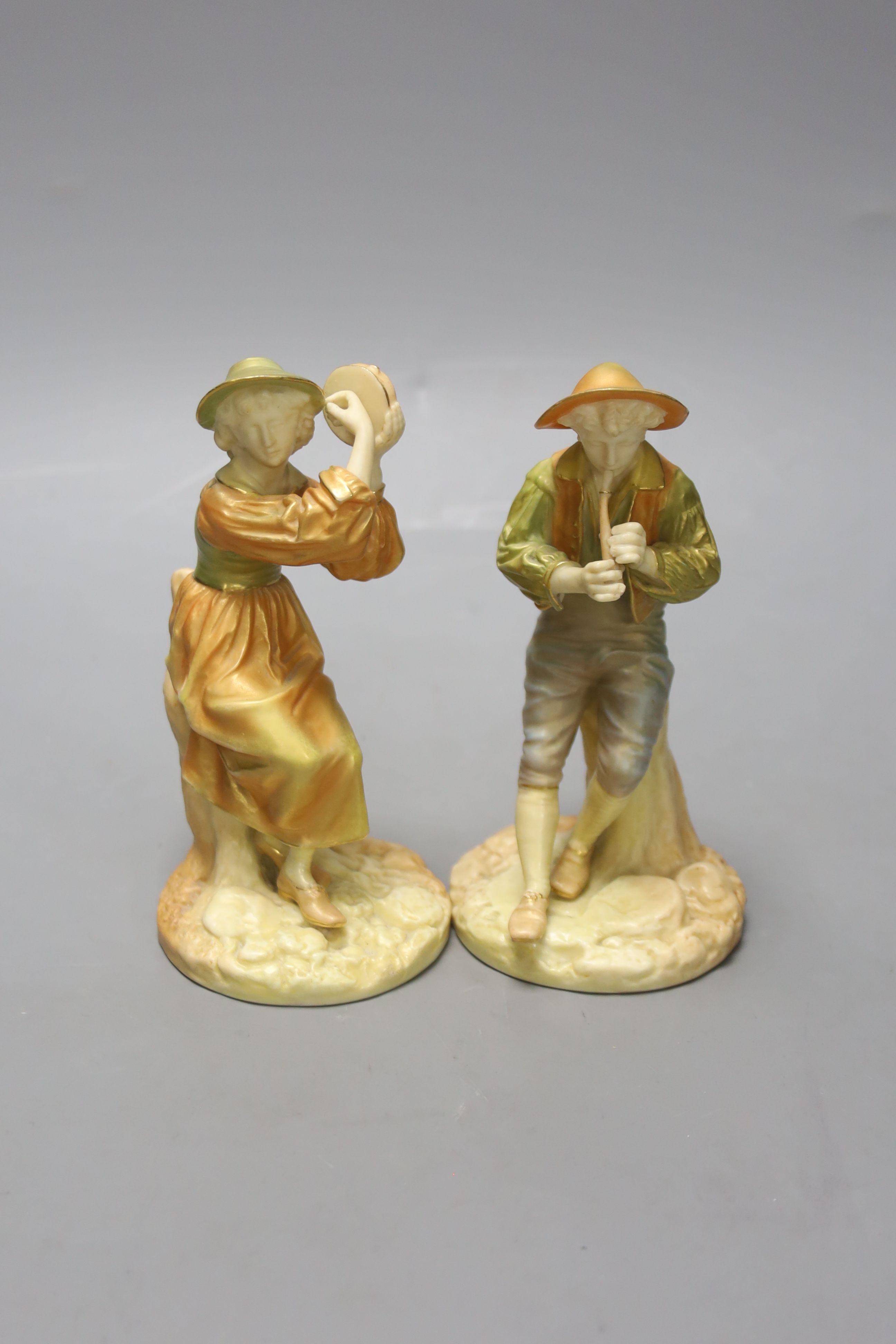 A pair of Royal Worcester figures of Stephen and companion, he with a flute and she with a tambourine, c.1890's, shot enamel mark, height 15cm